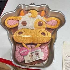 Wilton Cow Cake Pan with Yellow, Pink and Brown Accents